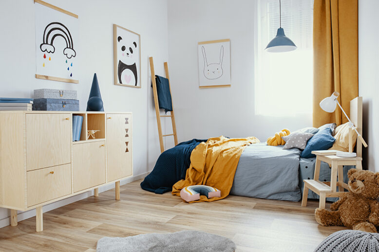 Stylish,Wooden,Commode,In,Bright,Bedroom,Interior,With,Poster,On
